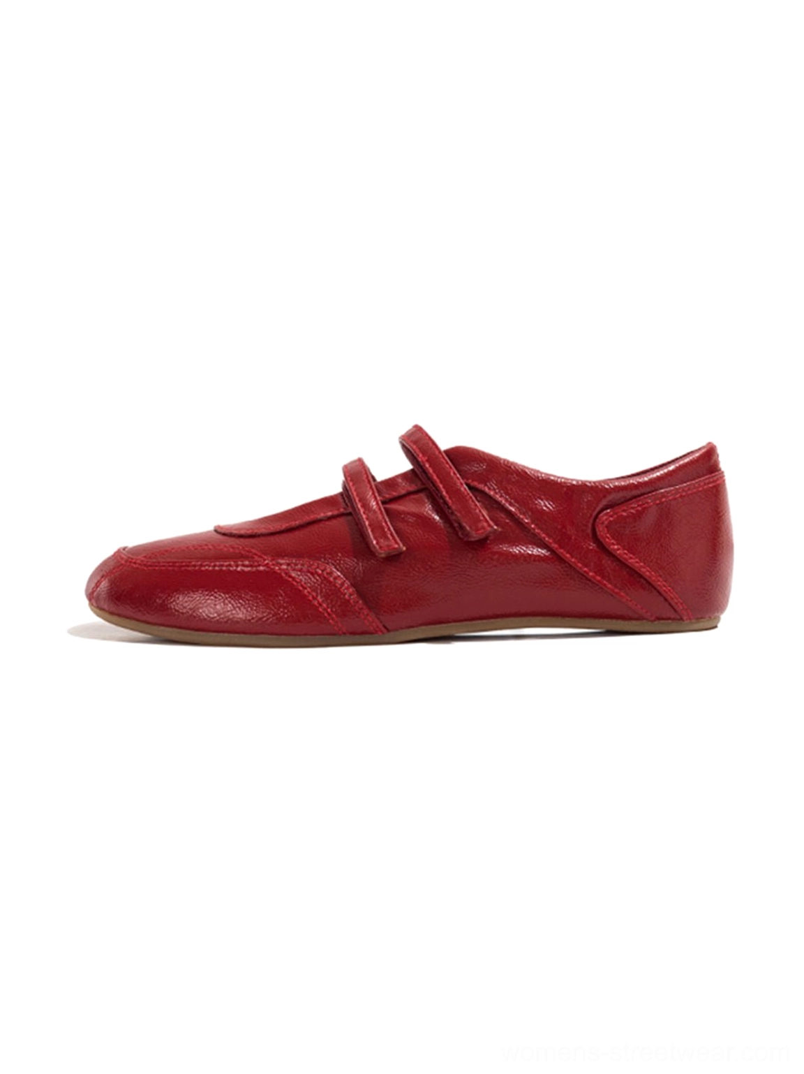 Red crisscross strap leather-look flats front view with rounded ballet-inspired toe and polished finish