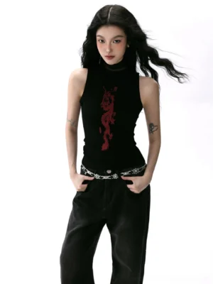 Black red dragon mesh turtleneck sleeveless fitted top shown in a three-quarter front view with black wide-leg jeans