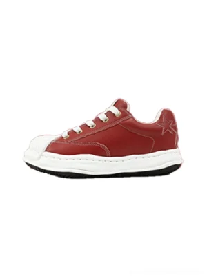Red molded-toe court sneakers with white shell toe, contrast laces, layered side panels, and black-trimmed outsole