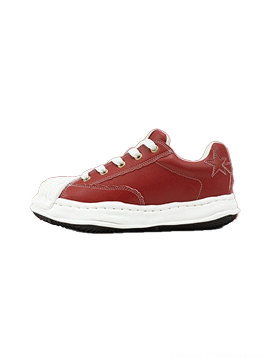 Red molded-toe court sneakers with white shell toe, contrast laces, layered side panels, and black-trimmed outsole