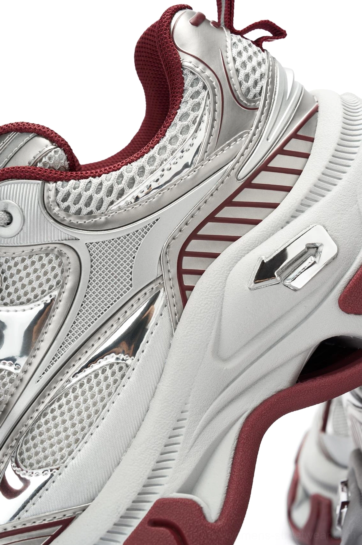 Red Papillon platform sneaker design with metallic finish, structured upper, burgundy laces, and statement streetwear proportions