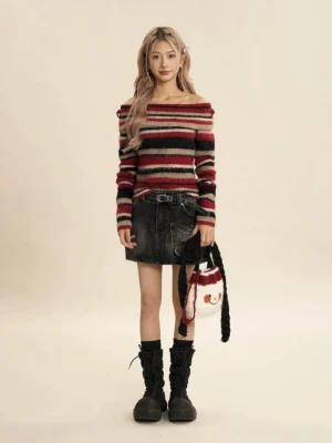 Red retro striped off-shoulder fuzzy knit sweater styled with a black denim mini skirt and platform combat boots front full body view