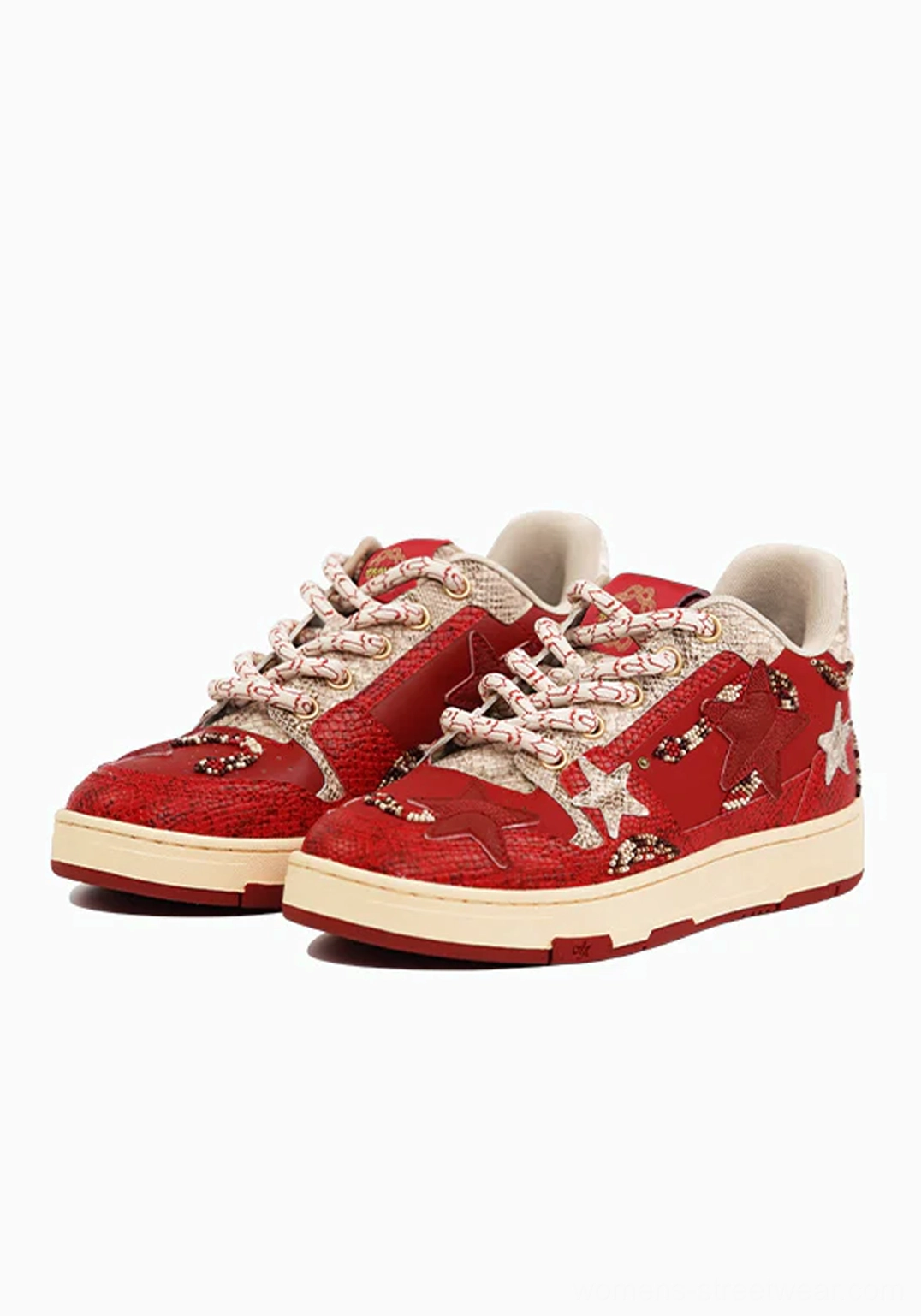 Red snake-embossed star court sneakers with layered white star panels and retro Y2K streetwear design