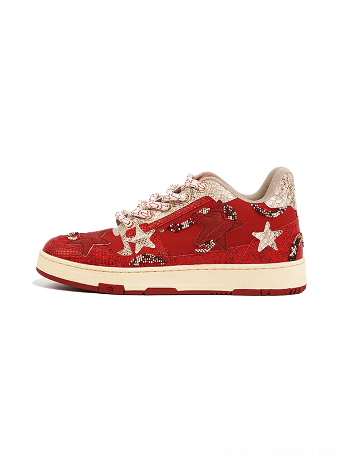 Side view of red snake-embossed star court sneakers with white star panels, pink-silver rope laces, and off-white rubber outsole