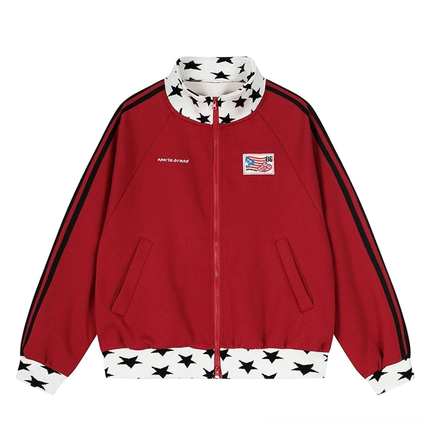 Red colorblock star print varsity track jacket with raglan sleeves, full zip front, sporty patches, and relaxed Y2K streetwear styling