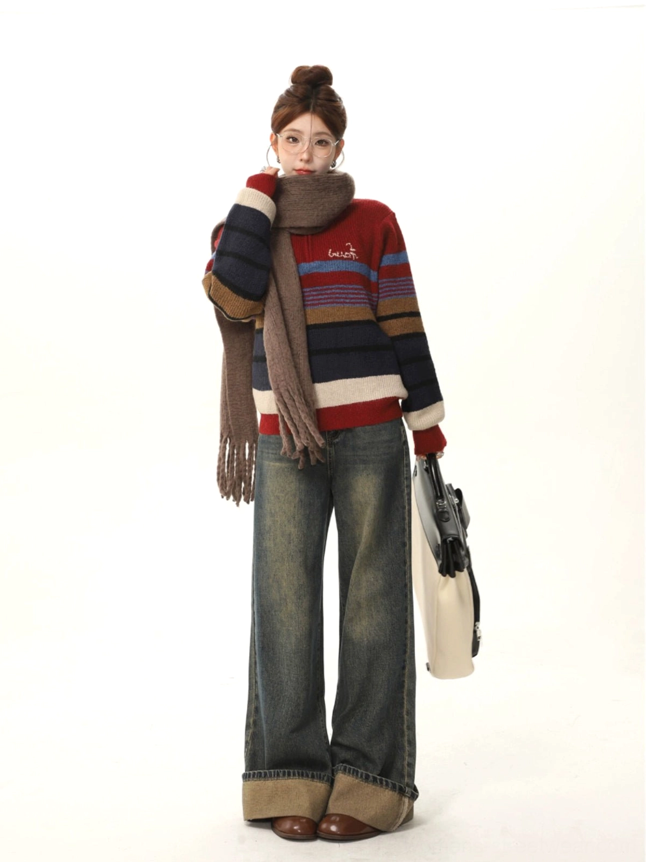 Relaxed red striped knit sweater outfit with wide-leg jeans brown tassel scarf and handbags for Seoul-inspired casual fashion