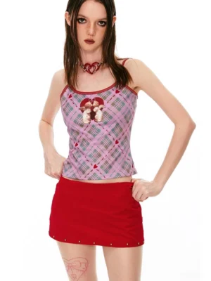 Red studded micro mini skirt styled with a purple plaid graphic camisole in a Y2K streetwear outfit