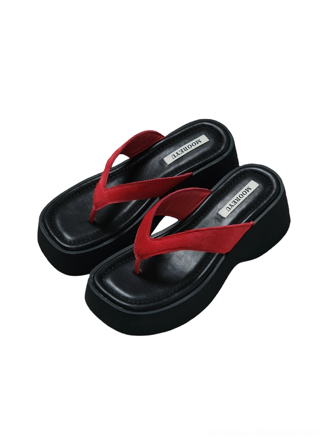Top view of two pairs of black platform flip-flops with bright red suede toe straps