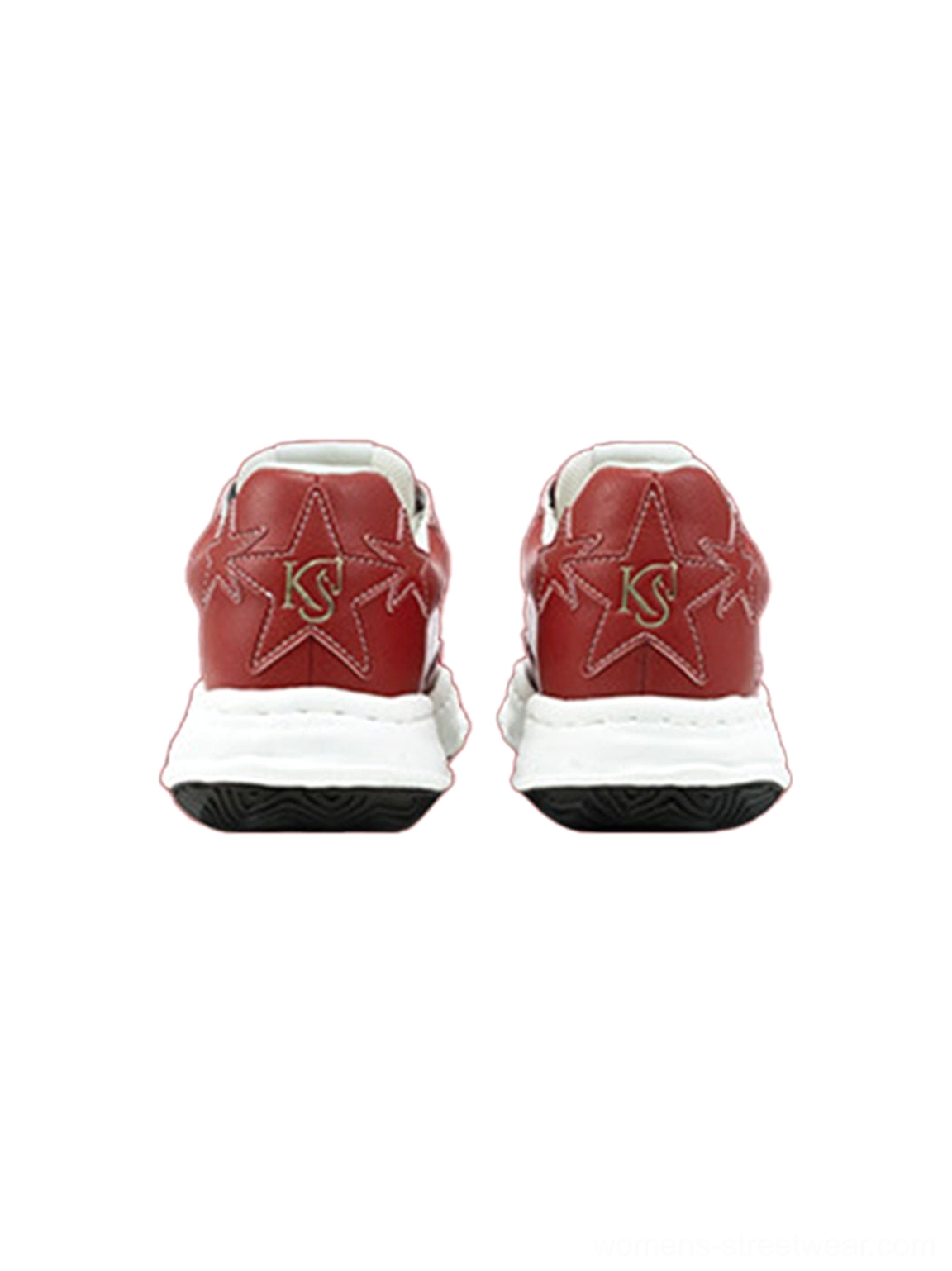 Red synthetic-leather low-top sneakers with molded shell toe and bold white-and-black color-blocked sole