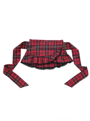 Top-down view of a red plaid tie-strap mini skirt featuring classic tartan fabric, long waist ties, ruffled hem, and contrasting black lace trim