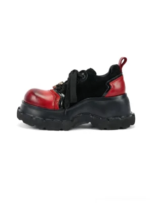 Black and red women's red toe platform derby shoes shown from a left front angle with horsehide and suede upper, rope laces, rear pull tab, and chunky serrated sole