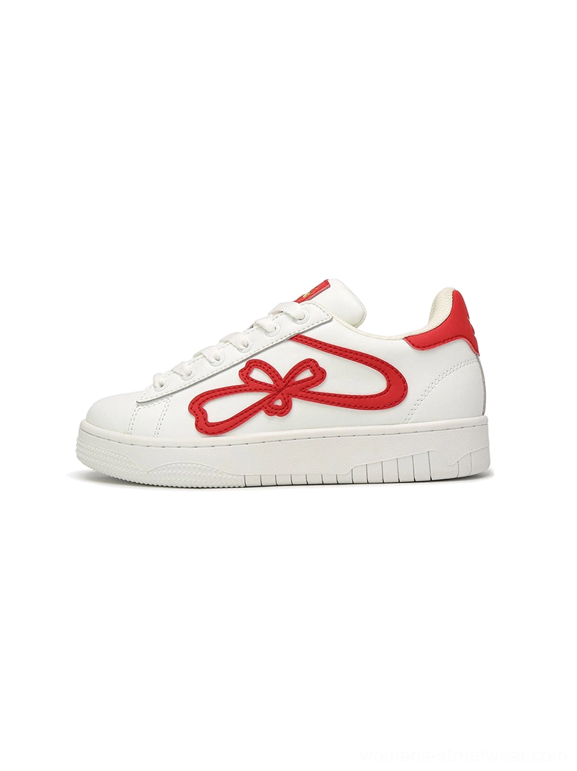 Red and white lucky clover chunky platform sneaker shown from the side with contrast clover bow detail