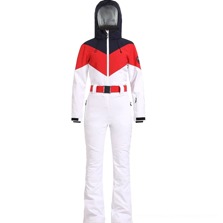 Red white navy women's hooded colorblock ski suit displayed from the front with flared white ski pants and removable red waist belt