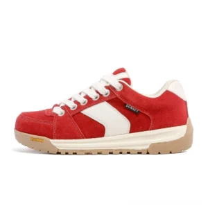 Red and white suede court sneakers with contrast side stripe, cream laces, thick gum rubber sole, and retro streetwear design