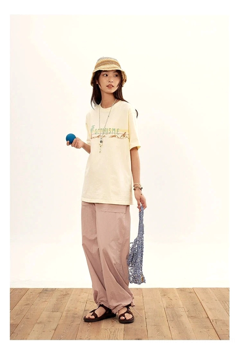 relaxed nylon cargo pants crop top pairing styling minimalist streetwear aesthetic