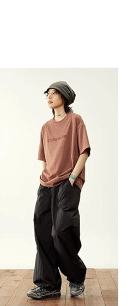 relaxed nylon cargo pants jet black casual standing full-body comfortable loose silhouette streetwear