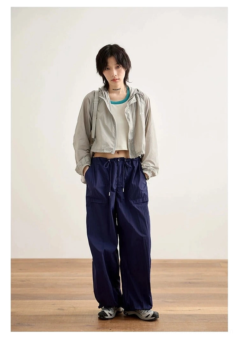 relaxed nylon cargo pants monochromatic outfit neutral color styling streetwear elegance