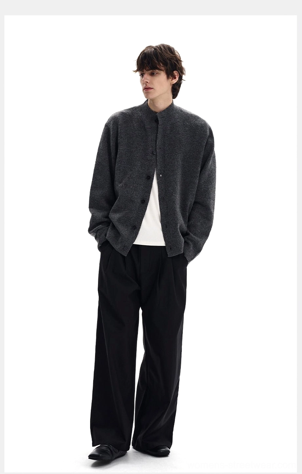 Relaxed charcoal brushed knit cardigan side view showing loose silhouette and stand collar design