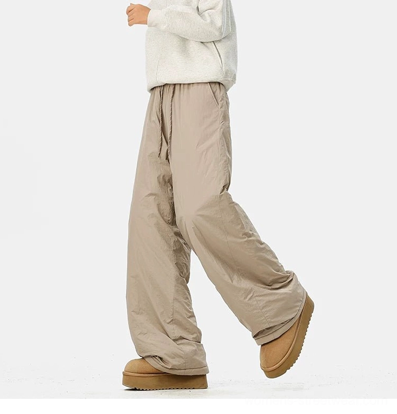 Relaxed convertible streetwear pants with wide legs, soft fleece lining, and modern urban winter styling