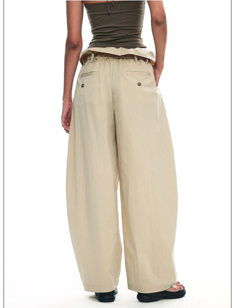 Relaxed drawstring paperbag wide-leg streetwear trousers premium fabric and silhouette detail view