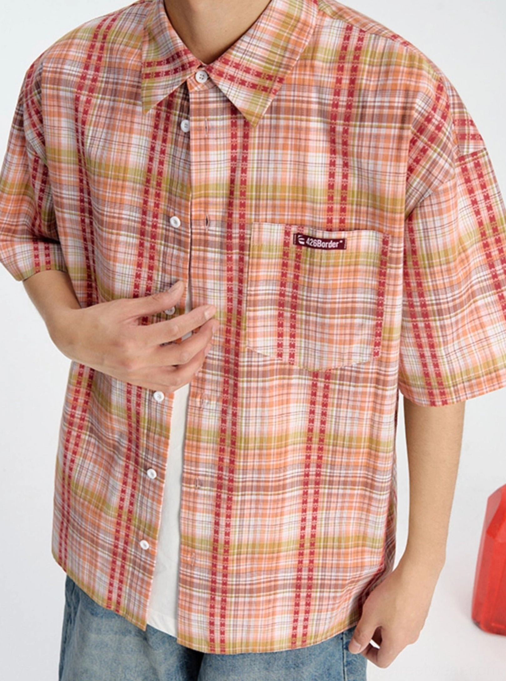 Relaxed embroidered checkered shirt image for Korean fashion outfits, summer layering, and contemporary streetwear looks