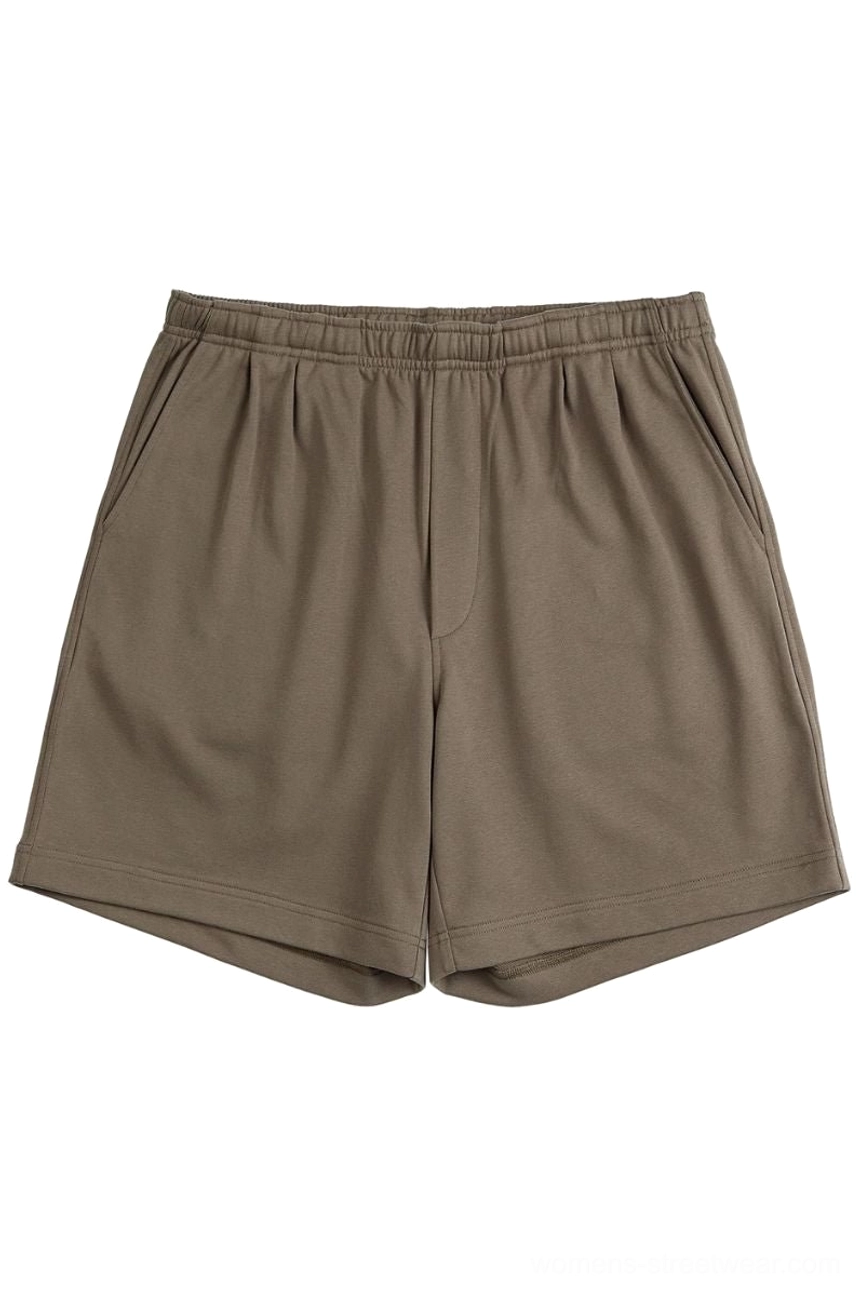 Taupe brown relaxed fit French terry streetwear shorts with elastic waistband, side pockets and straight leg hem displayed on a white background