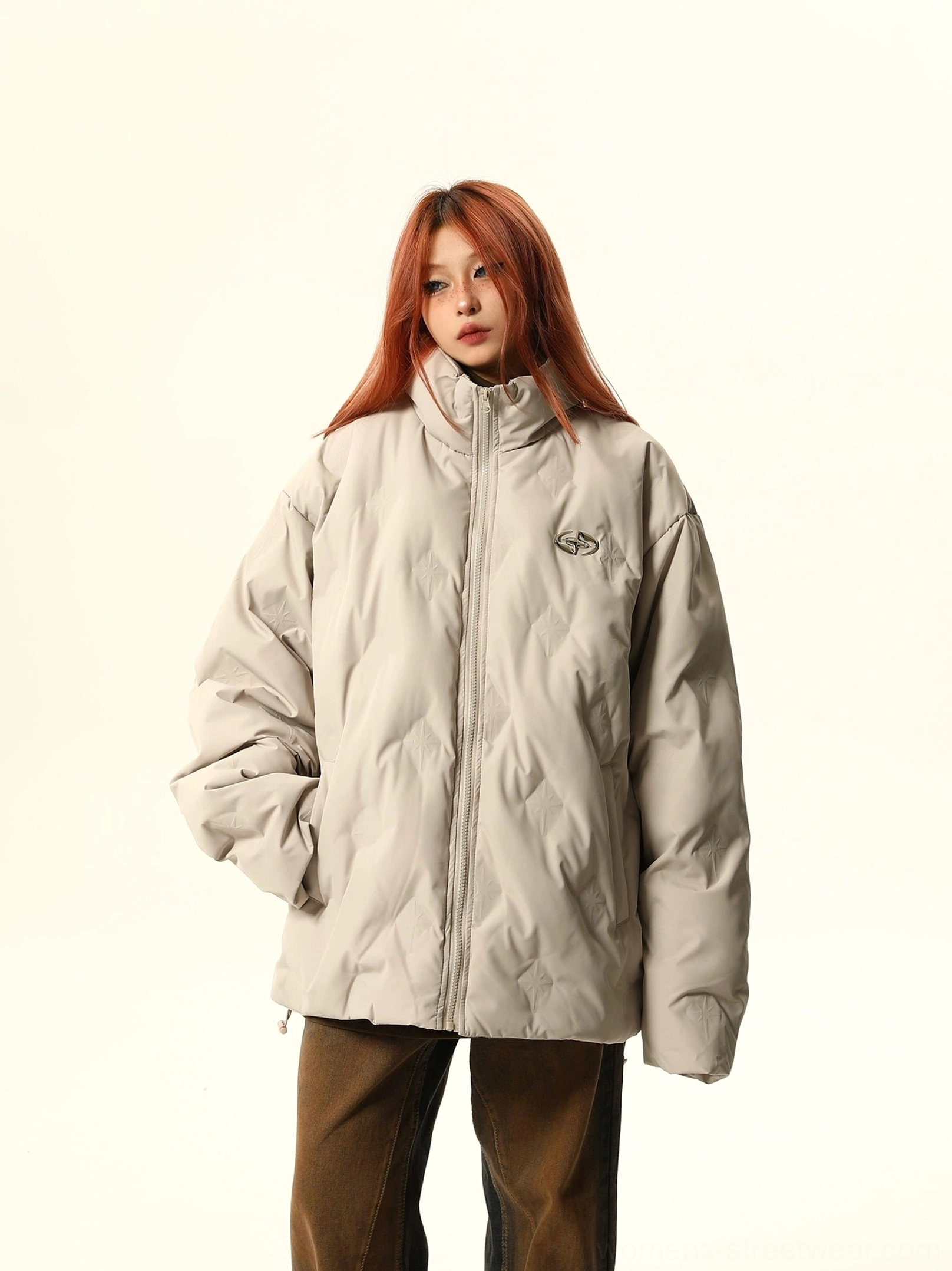 Relaxed fit oversized puffer bomber jacket with quilted texture, front zipper, and contemporary Korean streetwear design