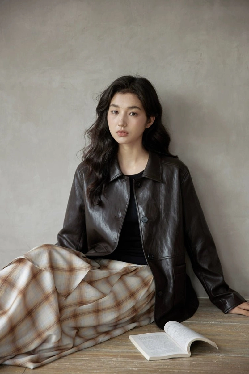 Relaxed fit women’s leather-look jacket designed for Korean fashion and contemporary streetwear layering