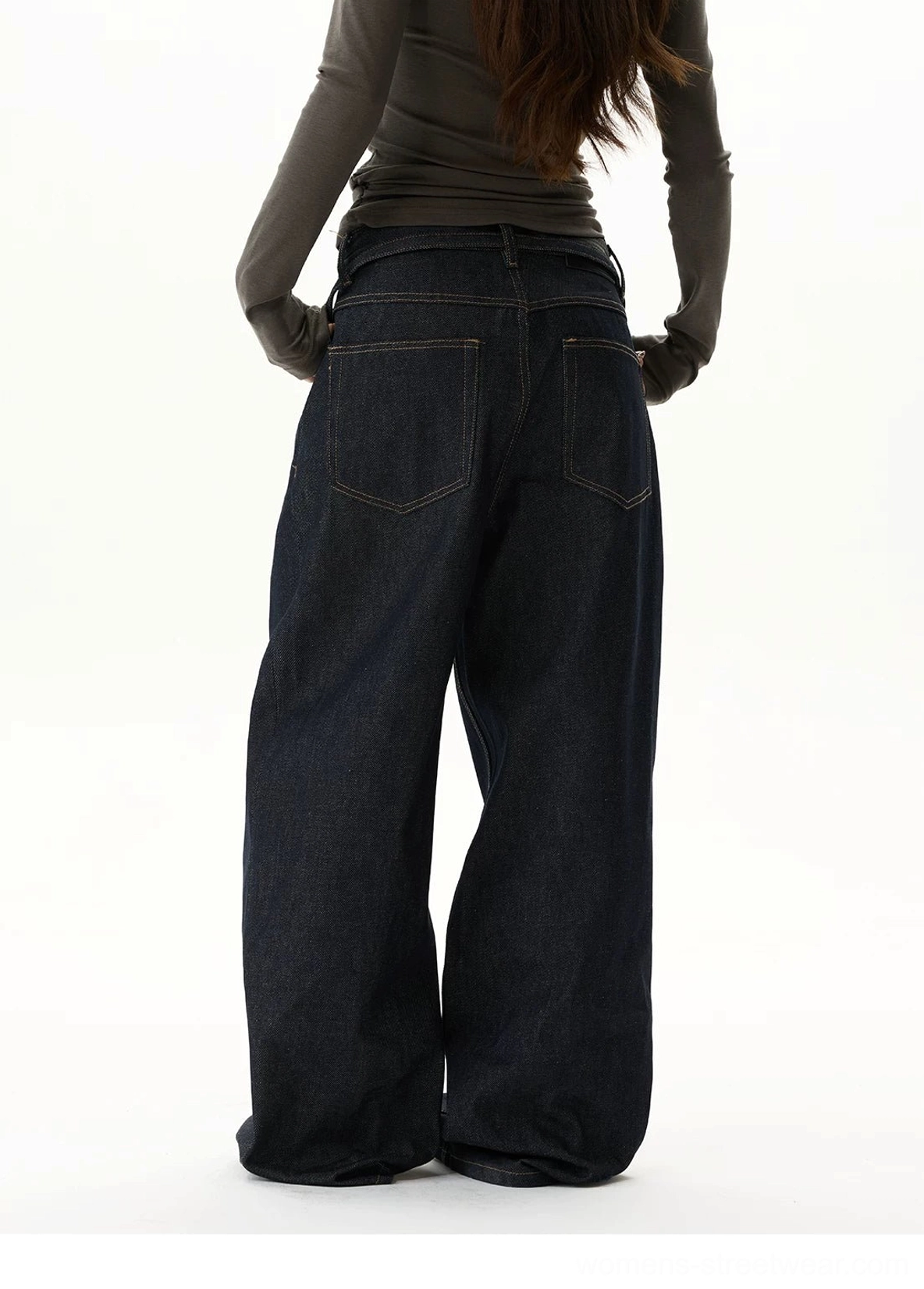 Relaxed oversized indigo balloon jeans designed with long column-like legs, contrast seam stitching, and modern Seoul-inspired proportions