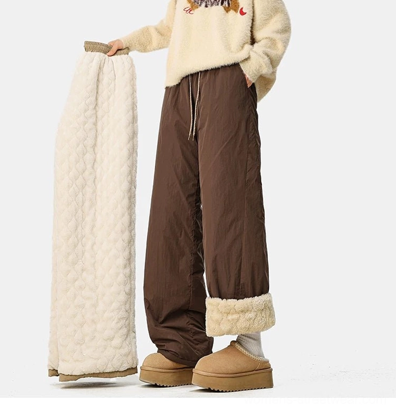 Relaxed Korean streetwear wide-leg pants with crinkled shell, fleece interior, and practical drawstring waist