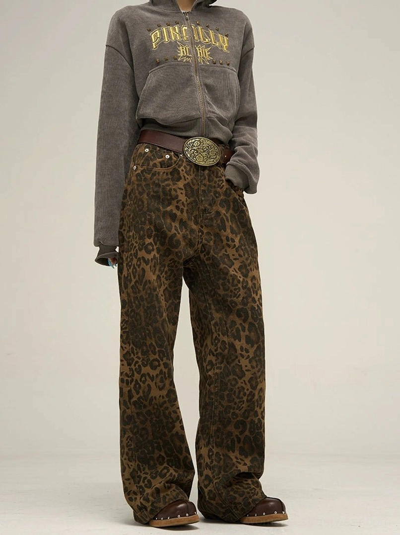Three-quarter view of relaxed leopard print wide leg pants with flowing cotton-blend fabric and casual Seoul streetwear styling