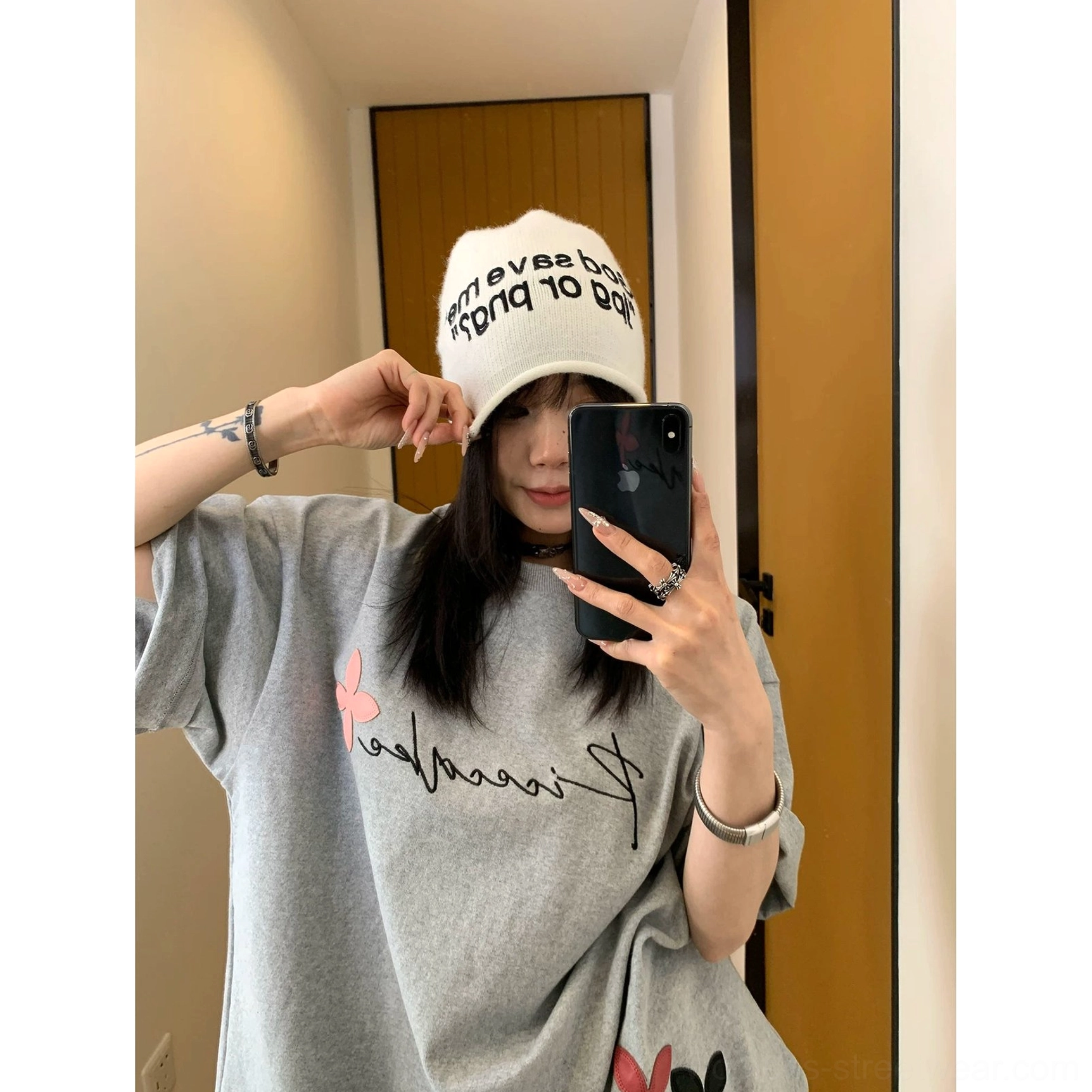 Relaxed oversized floral graphic tee with crew neckline, dropped shoulders, wide sleeves, and contemporary Seoul fashion styling