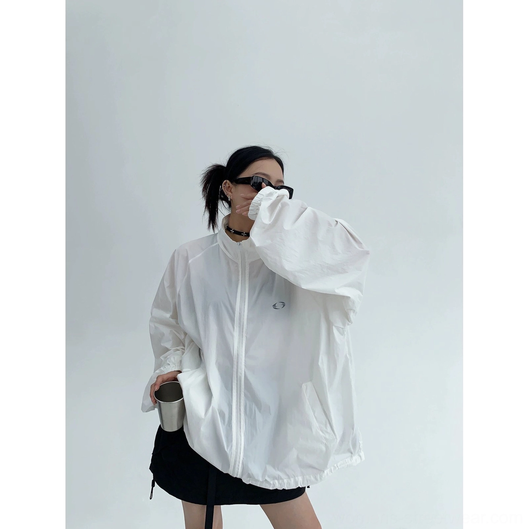 Relaxed oversized windbreaker jacket product image for women featuring a breathable sun-protection shell, high collar, long sleeves, and everyday streetwear styling