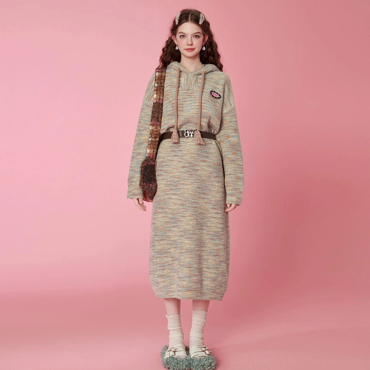 Front view of a relaxed hooded space-dyed knit midi sweater dress with drawstrings, long sleeves, and modern Seoul streetwear styling