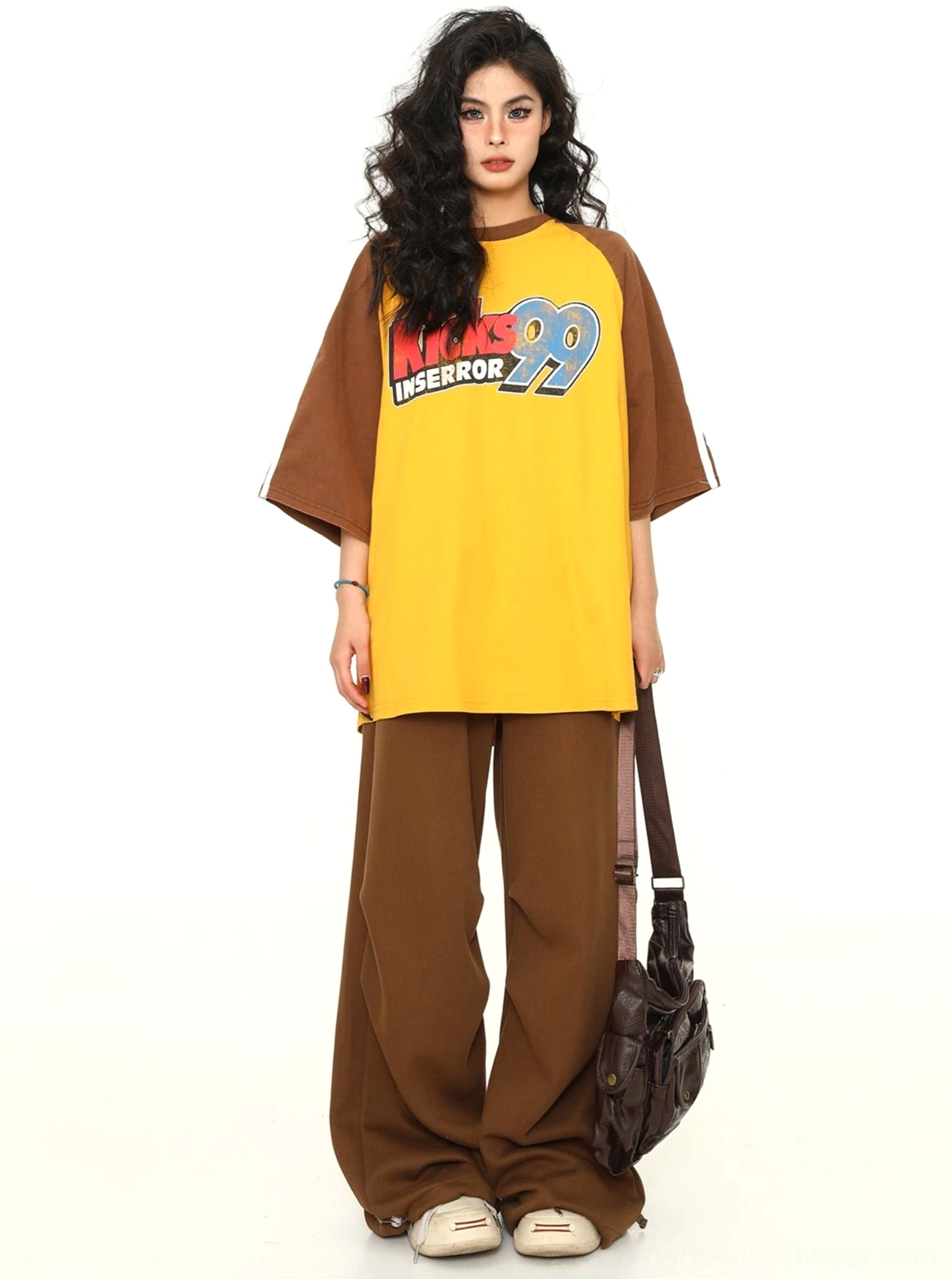 Relaxed varsity baseball tee with raglan sleeve styling and vintage-inspired streetwear appeal