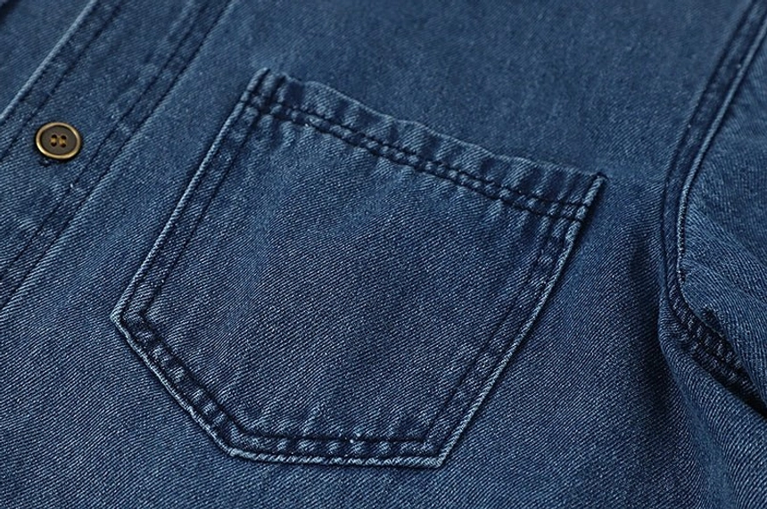 Relaxed vintage denim shirt jacket in dark washed blue for women's casual outfits, layering, and street style