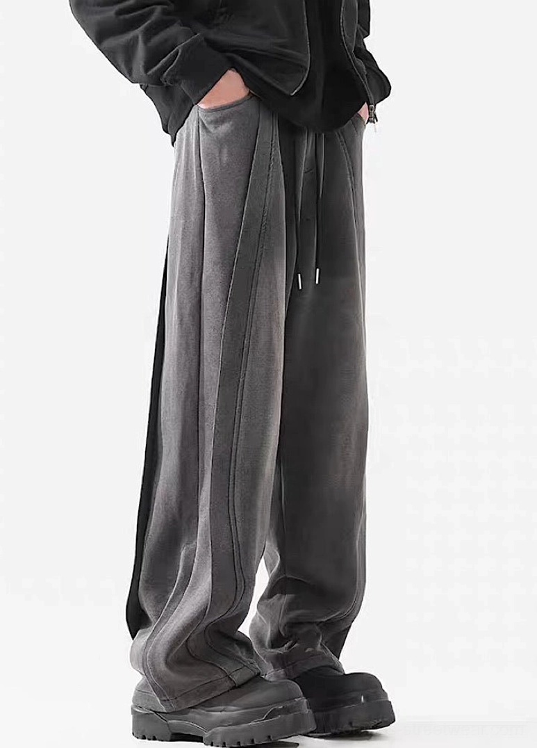 Relaxed wide-leg streetwear trousers with washed finish, neutral color options, and contemporary Seoul style
