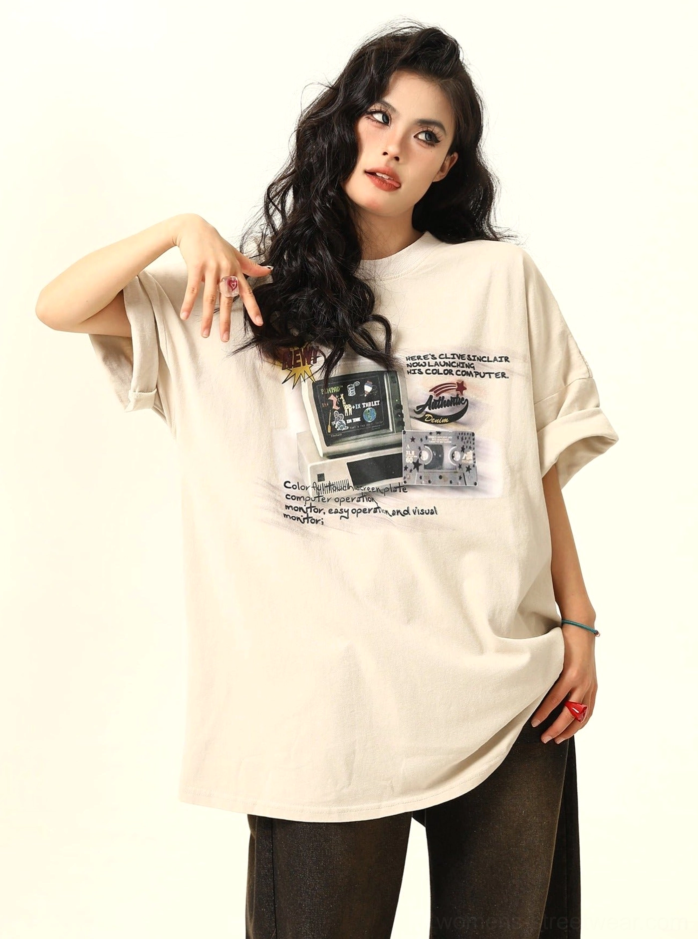 Close front view of apricot retro arcade graphic oversized T-shirt with vintage gaming inspired chest print