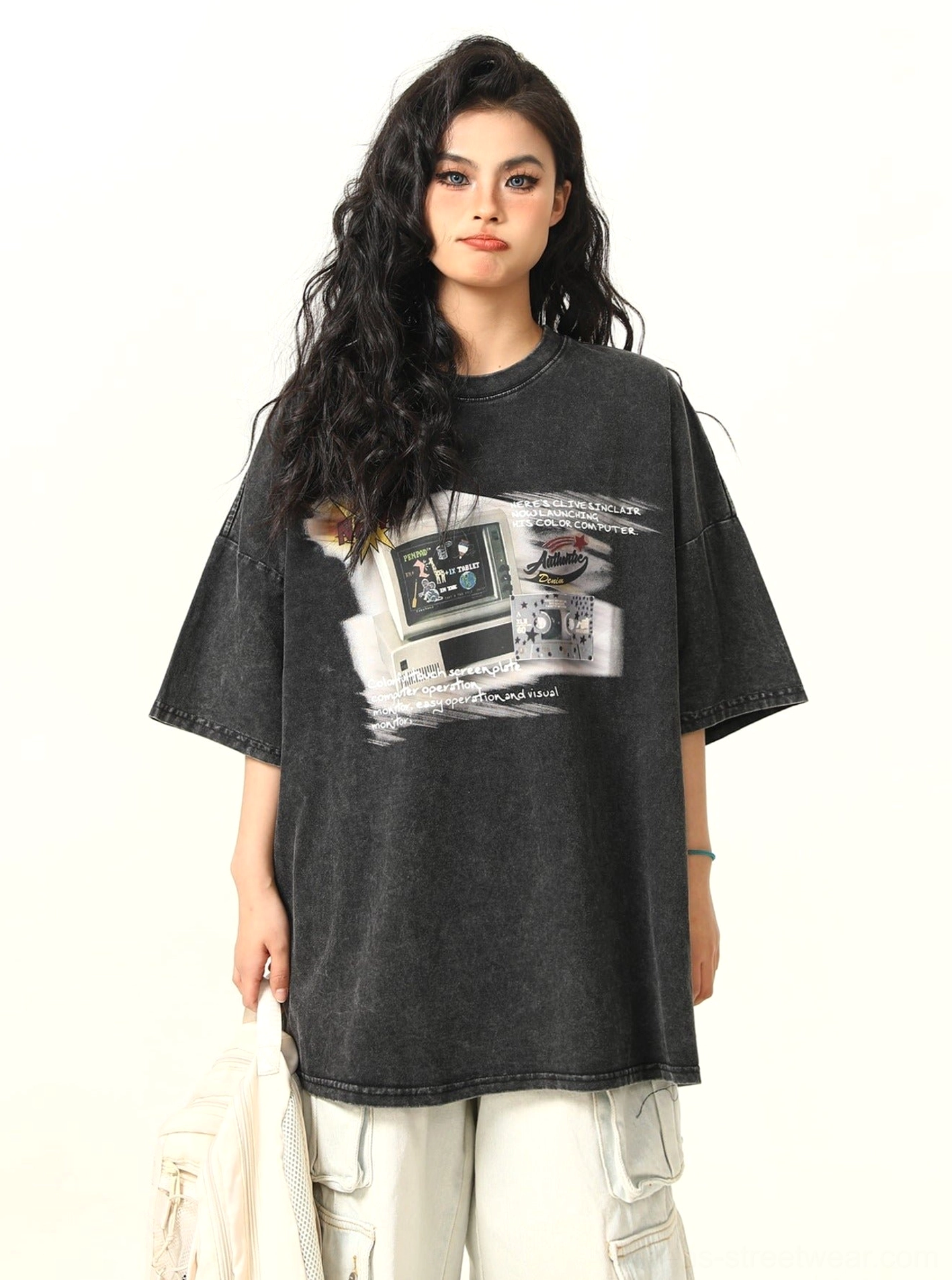 Washed charcoal black oversized retro gaming graphic T-shirt for women with relaxed streetwear silhouette