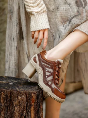 Brown Mix retro colorblock block heel sneakers worn with a linen dress in an outdoor streetwear setting