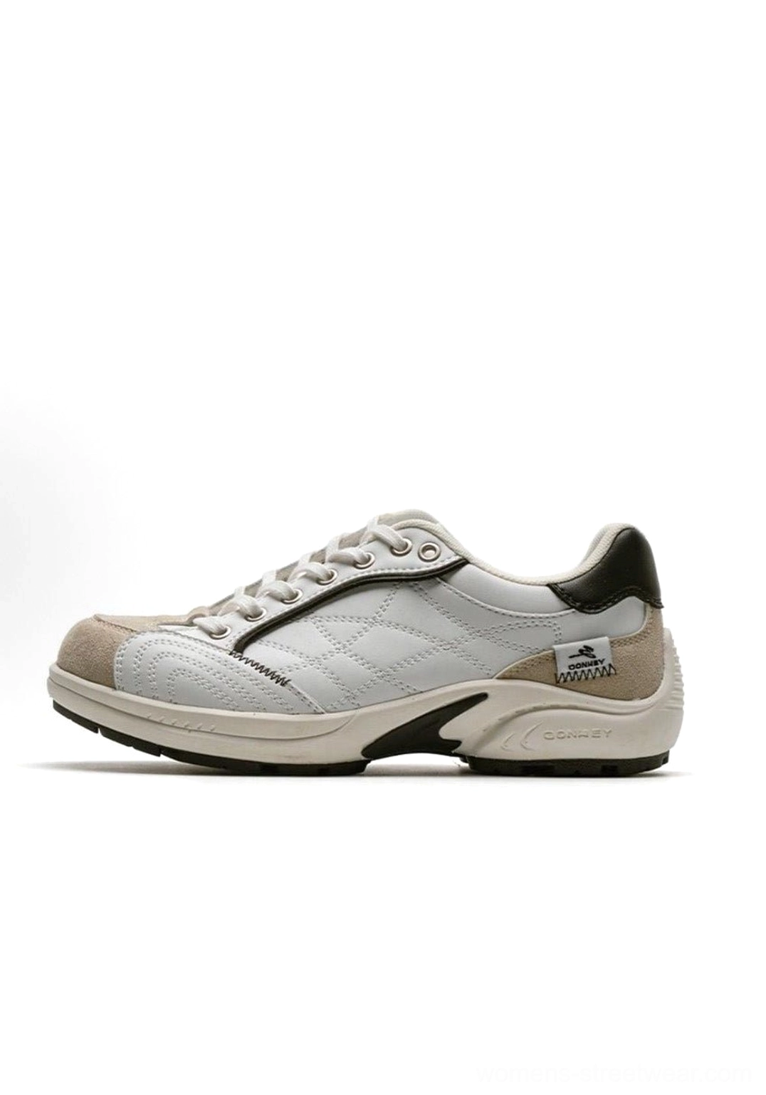 Three-quarter view product shot of retro colorblock German trainer sneaker on white background showing overall silhouette and design balance