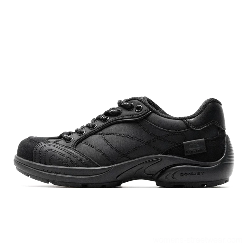 All-black retro cross-stitch low-top runner sneakers with black laces and black rubber sole
