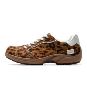 Leopard print retro low-top runner sneakers with white trim and brown rubber outsole side profile