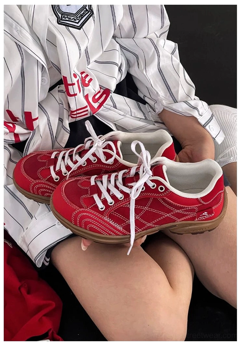 Retro cross-stitch low-top runner sneakers showing durable rubber and TPU outsole detail