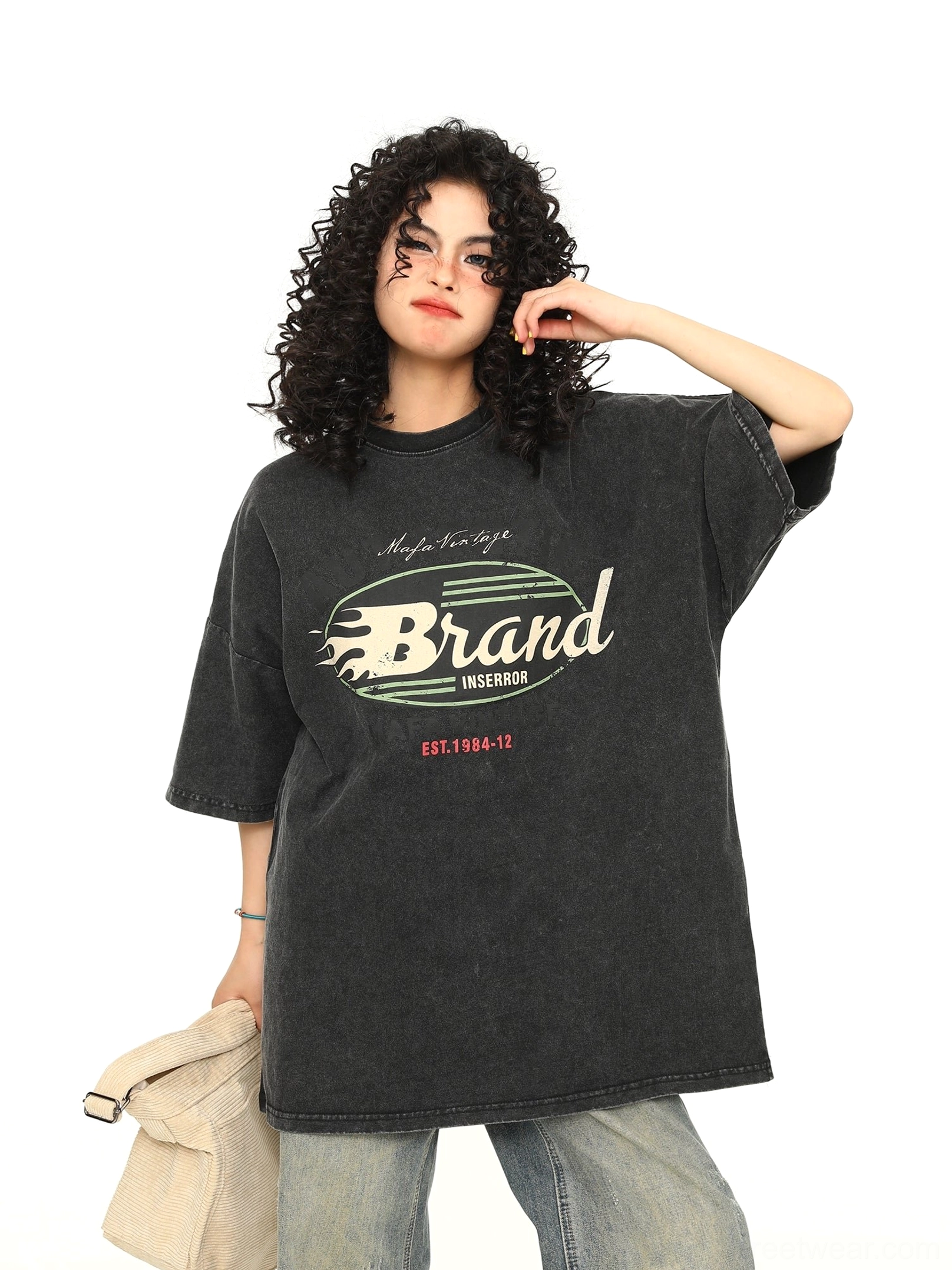 Black retro flame oversized streetwear T-shirt front three-quarter view with faded wash finish