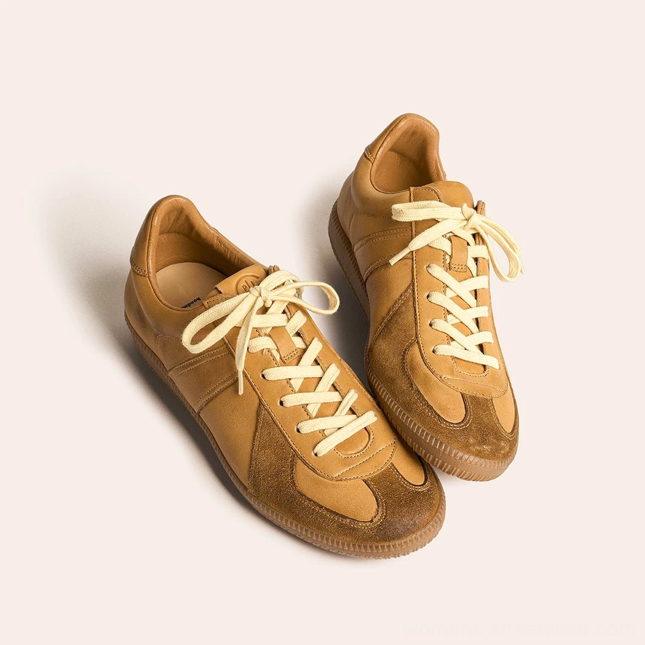 Tan brown retro German army leather sneakers with cream laces and classic vintage gum rubber outsole side view