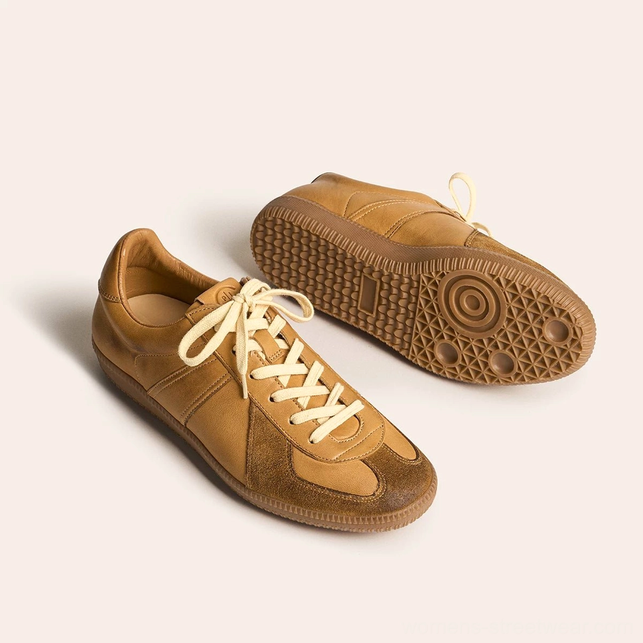 Tan brown leather retro sneakers with cream laces and patterned gum outsole in overhead and side studio view