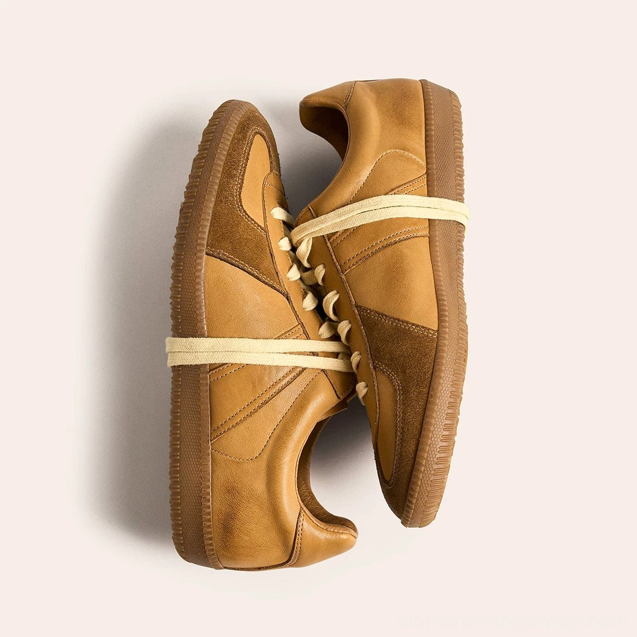 Premium washed leather retro sneakers with classic German army inspired gum sole silhouette