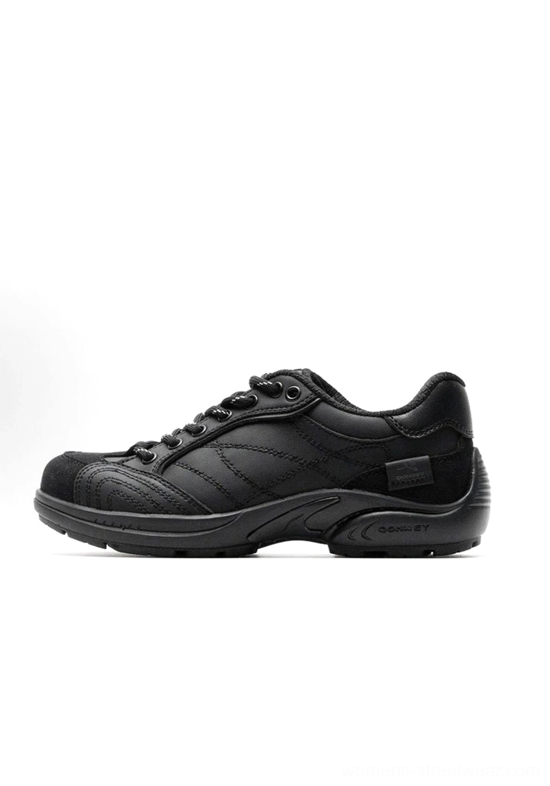 Fashion editorial style product photography of retro colorblock German trainer sneaker with professional lighting and premium presentation