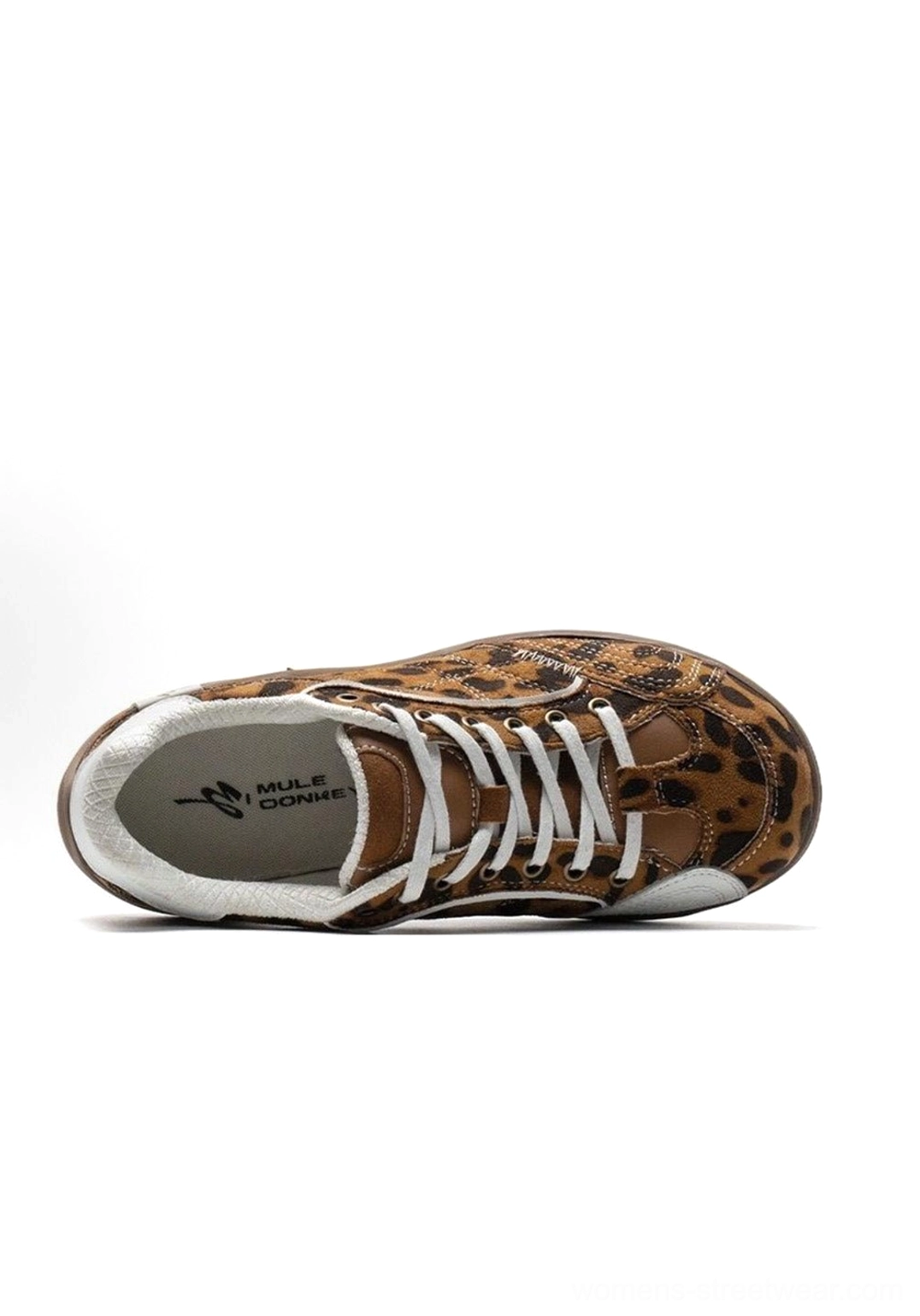 Quarter view product display of retro colorblock German trainer sneaker emphasizing architectural curved overlay construction and design innovation